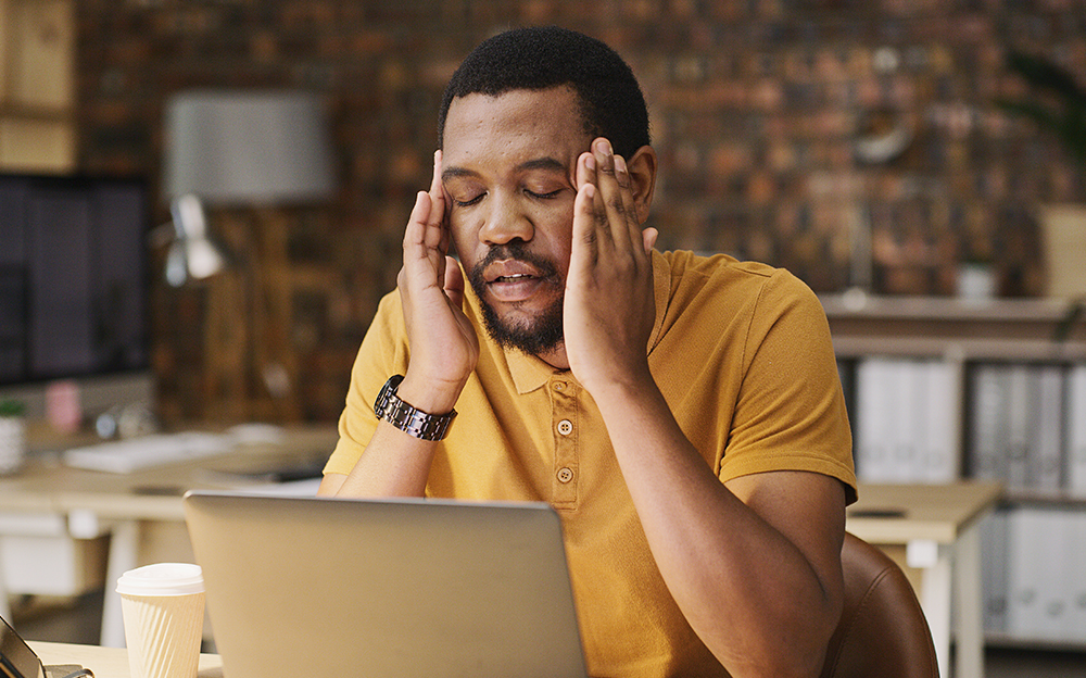 Man suffering with headache